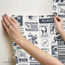 Jurassic World Dominion Signs Peel And Stick Wallpaper Tan/Blue - RoomMates -Roommates GUEST 9bebc459 3c57 4555 b27b e4e156778ae1